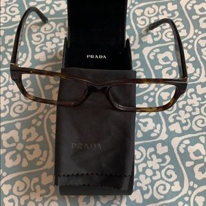Prada eye glasses.
